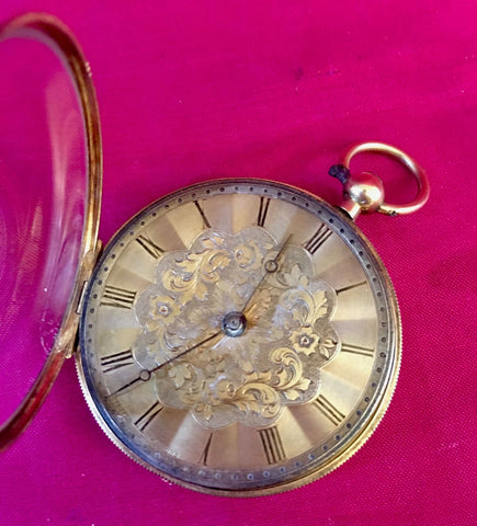 Small gold pocket watch